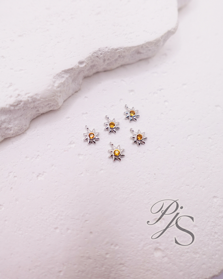 permanent jewellery sun charms